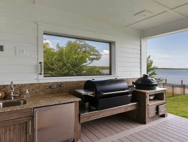 Bells River Residence Nestled in the serene Waterman’s Bluff in Yulee, FL, this exquisite home offers 3,046 sq ft of living space, expanding to a total