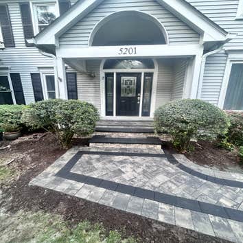 Photos by Bradstone Paving and Masonry Inc #1 Install new front patio in nicklock 6B9 granite city permanible pavers with raven 6B9 double Edge