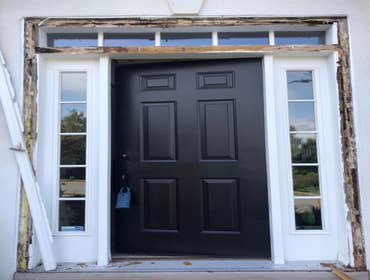 Main entry door with 2 sidelights Existing door frame rotted away due to water damage, remove the old door and two sidelights and install new entry doo