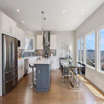 Sunny Side Remodel The home has it all brand new: electrical, heating & plumbing systems, tank-less water heater, Carrier furnace, HansGrohe plumbing f
