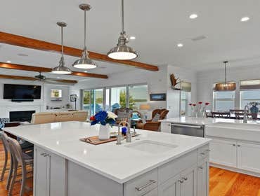 Bells River Residence Nestled in the serene Waterman’s Bluff in Yulee, FL, this exquisite home offers 3,046 sq ft of living space, expanding to a total