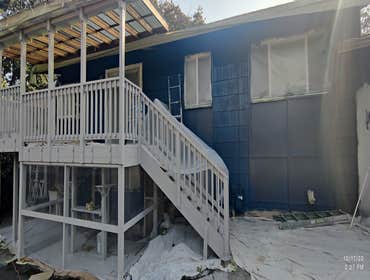 Saul's Quality Painting LLC Project #1 Initially Just a repainting of the home, later the client asked to add the painting of the deck to the job agree