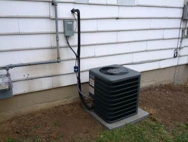 A Guy And A Girl Heating & Cooling Project 4 A home in Forest Park, OH that was a victim of copper theft. I installed a new 13 SEER air conditioning co