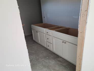 Cabinets Installing some cabinets today. These are white shaker-style cabinets made with real plywood and maple lumber, soft close hardware, dovetail d