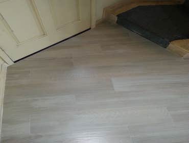 Porcelain wood plank Porcelain wood plank floor throughout the house.