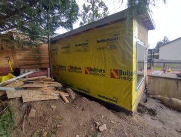 Photos by Stewart & Son Gate & Fence LLC #1 Tiny House with pergola. Small house 17' by 12' small bathroom with pocket door, and small sink with water 