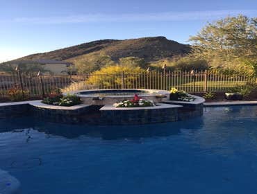 Reverse negative edge Travertine deck, spa, reverse negative edge play pool,