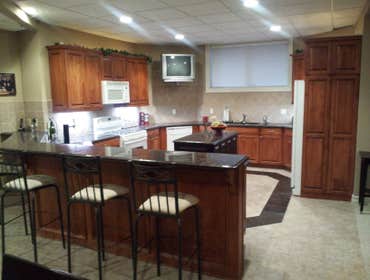 Paladino Homes-Tuscany Grove in Shelby Twp Basement Finish Carpentry- 3000 sqft- Full kitchen install with wainscotting, Theatre surround build includi