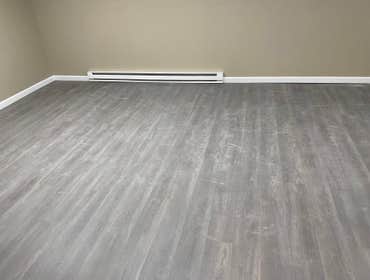 Photos by Kmas Construction Group #5 Creation of basement studio and laundry room including heating and baseboard and trim