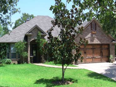 Cedar Garage Door and Backyard Kitchen
