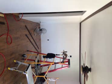 Photos by Barron Roofing, LLC #2 Remodeling of a livingroom in Artesia, NM
Home built in 1950's
Gutted entire living room
Installed new Sheetrock
Tape 