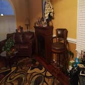 Photos by Alfreds Home Improvements #3 Room Addiiton with side porch, hardwood floors, and a fireplace.