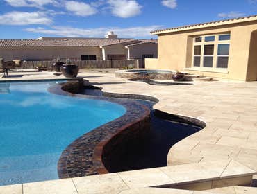 Reverse negative edge Travertine deck, spa, reverse negative edge play pool,