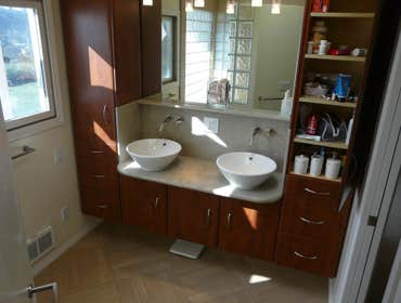 2003: Summer Flame Stone & Glass Bath This young couple’s first project when they moved into this home was to redo the master bath and closet. They rea