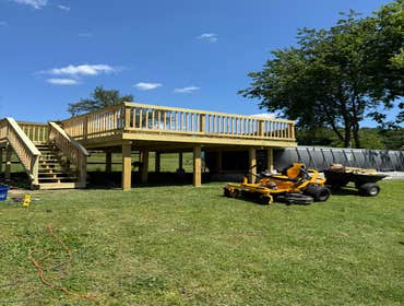 Photos by Fjm Remodeling #1 Above pool 16x16 deck