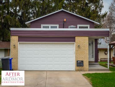 Photos by Ardmor Construction #1 New IKO Cambridge in Dual Black
EDCO Prism 6" Steel Siding in Bordeaux
New Mastic Gutters & Leaf Sentry Gutter Covers
