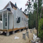 Photos by Blanchard's Mobile Home Removals and Transport Inc #1 New Clayton 16' X 76' Single wide Manufactured Home Spread Base Pad For Home, position 