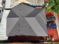 Photos by Gold Star Miami Corp #1 metal roof panels all are . 25 years warrantee