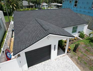 Photos by WOODSTONE ROOFING