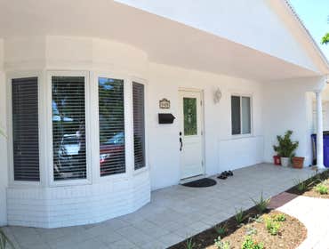 Deerfield Beach House - Installation Removed non-impact awning type windows and replaced with impact casements.