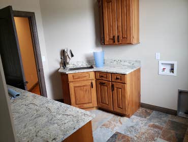 Photos by North Country Construction Inc #1 We built this gorgeous 5,000 SF house for a client in the powderhorn. It has a attached 3 car garage on a n