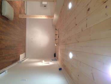 Basement finish in dennis Finished basement with new laminate flooring, knotty pine ceiling, and columns, knotty pine barn door, and half bathroom/laun