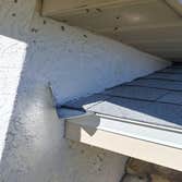 Photos by Flagship Roofing LLC #1 Stucco covered flashing needed to replaced while doing re-roof