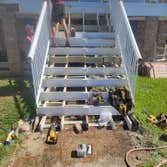 Exterior back patio renovation Refinish shutters, repaint stairs, correct rotten framing, replace upper decking with 1x4 tongue and groove pine and rep