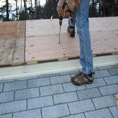 Fastening panels to deck