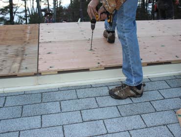 Fastening panels to deck