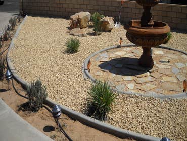 Artificial Turf Installation Before and after pictures for a synthetic turf system.