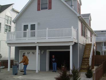 Photos by Saviors Custom Carpentry, Inc #1 Composite steps, vinyl railings & 1x4 azek