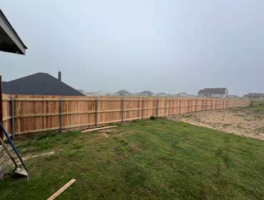 Photos by Paddco LLC #2 Total of 550Ft of privacy Cedar fence with two gates.