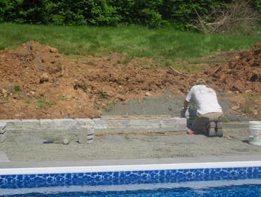 Photos by Dunn Landscape Construction #1 After initial pool installation provide all hardscape including retaining walls, pool deck, walkways and plant