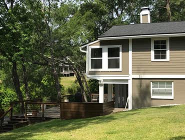 Rear of the home with deck