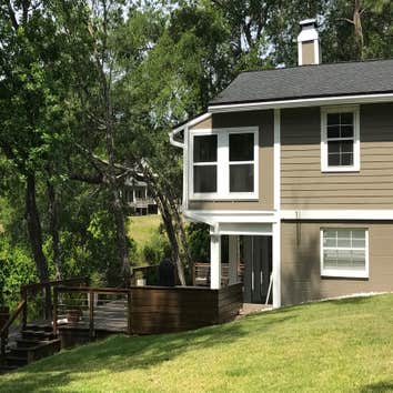 Rear of the home with deck
