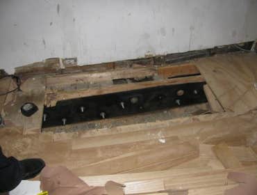 NYC Upper East Side Floor Leveling and Structural Girder Repair The apartment living room had a 5.5" slope from one side to the next spanning only 10'.