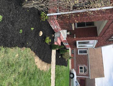 Photos by Steve Danylko Land Service #1 New lawn and landscaping