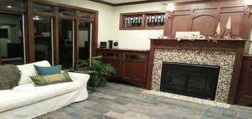 Sunroom with stone fireplace