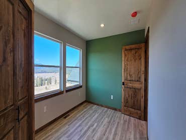 Photos by Wethered Timberworks LLC Dba Wethered Construction #1 Custom Home
