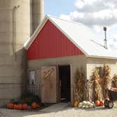 Fall Gift Shop- Pumpkins & Crafts (Re-roof) Remove existing asphalt shingles and add metal roofing with special metal flashing detail around existing s