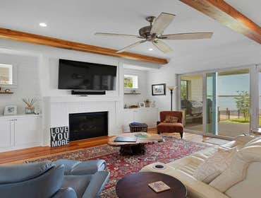 Bells River Residence Nestled in the serene Waterman’s Bluff in Yulee, FL, this exquisite home offers 3,046 sq ft of living space, expanding to a total