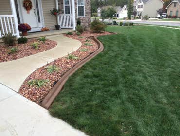 Hanover area we installed curbing around a retaining wall