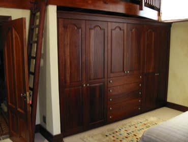 LAM Woodworks Here are some pictures of work done using different materials, from stained Mahogany to solid Bubinga or Beech, from Maple to Poplar for