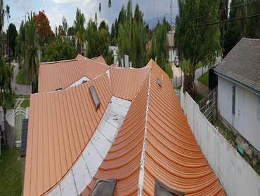 W Coral Way, Indialantic, FL, Residential reroof Shingles off Adlok Standing Seam Copper Penny