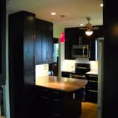 Nyack NY Kitchen Remodeling Completely transformed this home with a new open floor plan kitchen with updated appliances, custom granite counters, custo