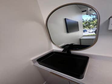 Photos by J Cor Plumbing, Electrical, General Contractor #1 JCor’s skilled plumbing team showcases the completion of a dual-sink installation at a mode