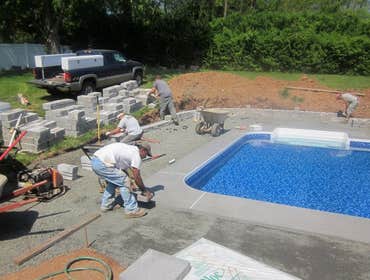 Photos by Dunn Landscape Construction #1 After initial pool installation provide all hardscape including retaining walls, pool deck, walkways and plant