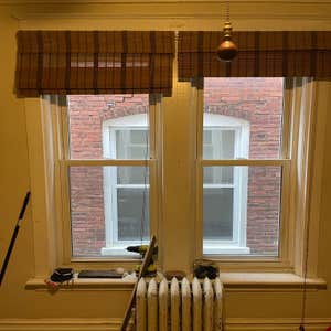Photos by Howze’s Painting Plus LLC #3 Living Room Repainted tan walls and white trim