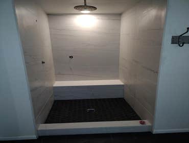 Flooring & Home Solutions LLC Bathroom with shower pan